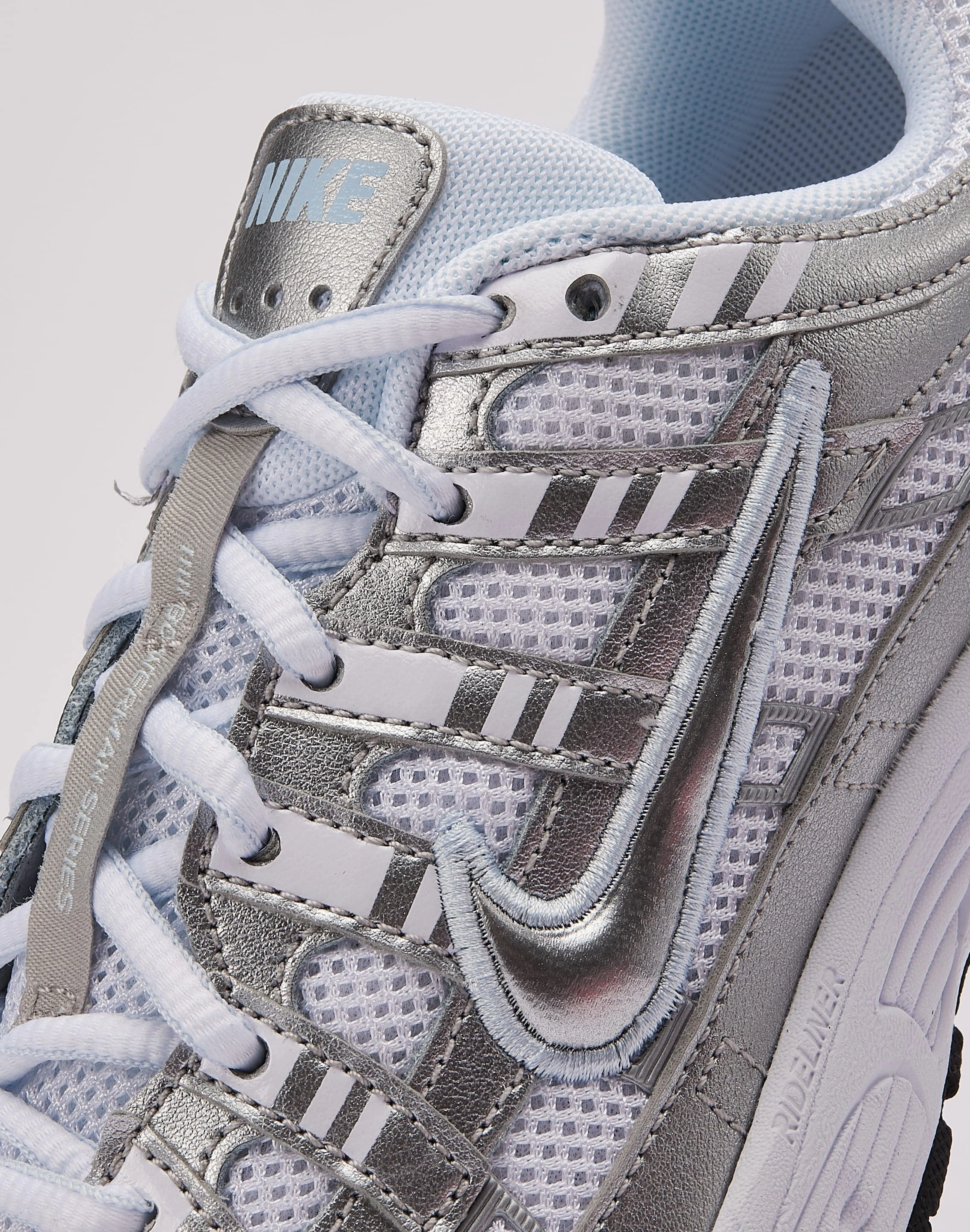 Nike P-6000 Grade-School running at night shoes