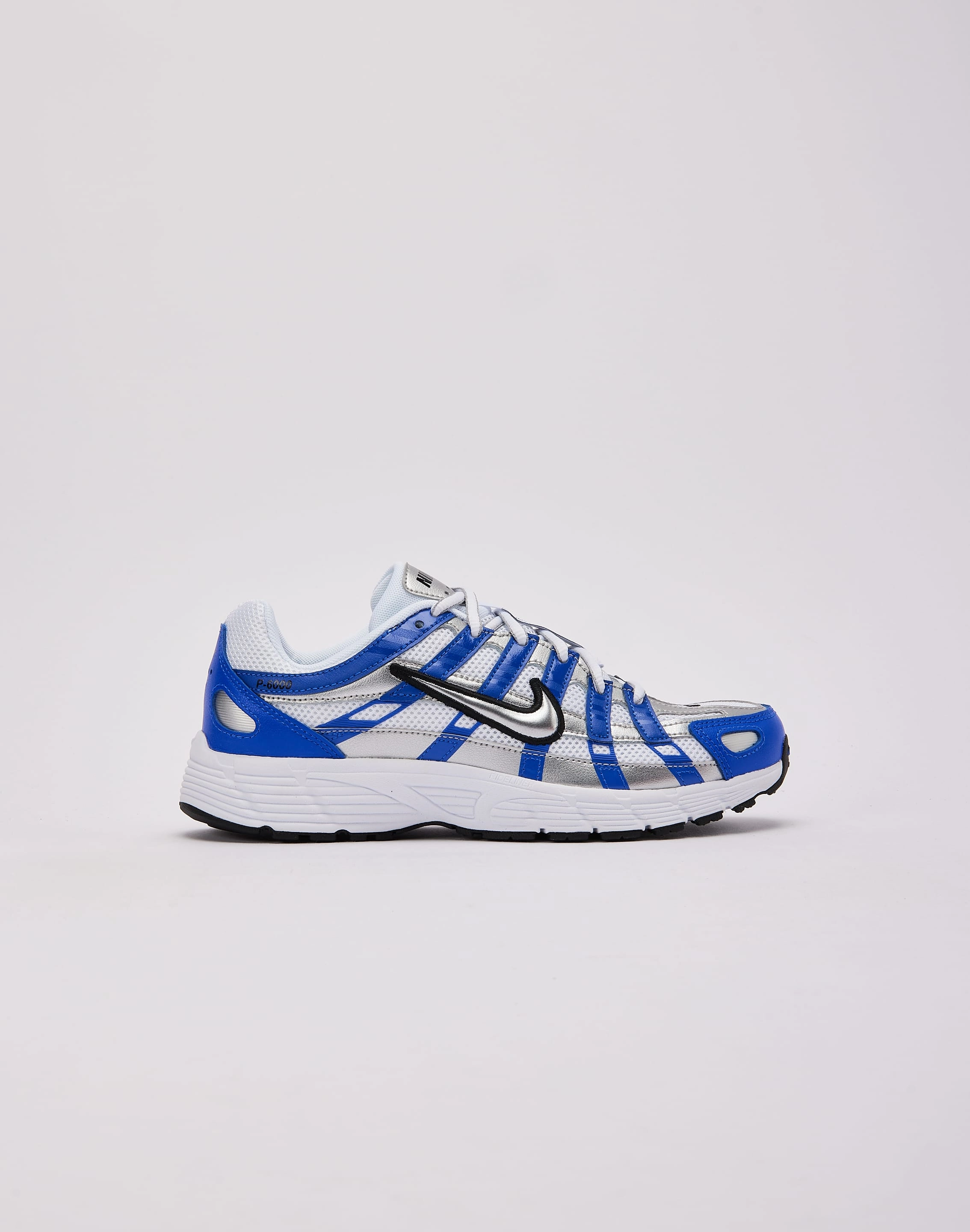 Nike P-6000 Grade-School running with a headband