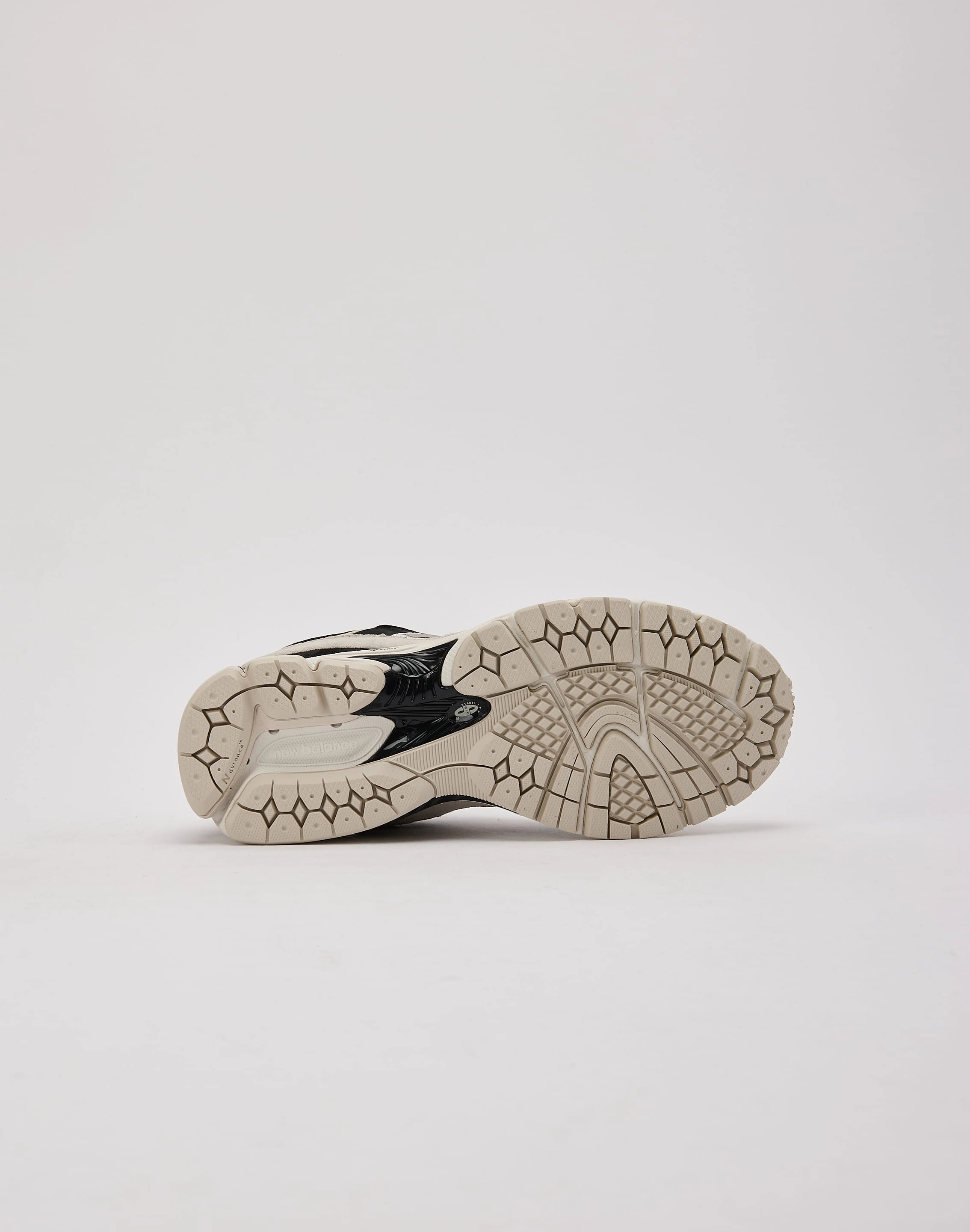 running in a kelp forest area shoes New Balance 2002R Grade-School