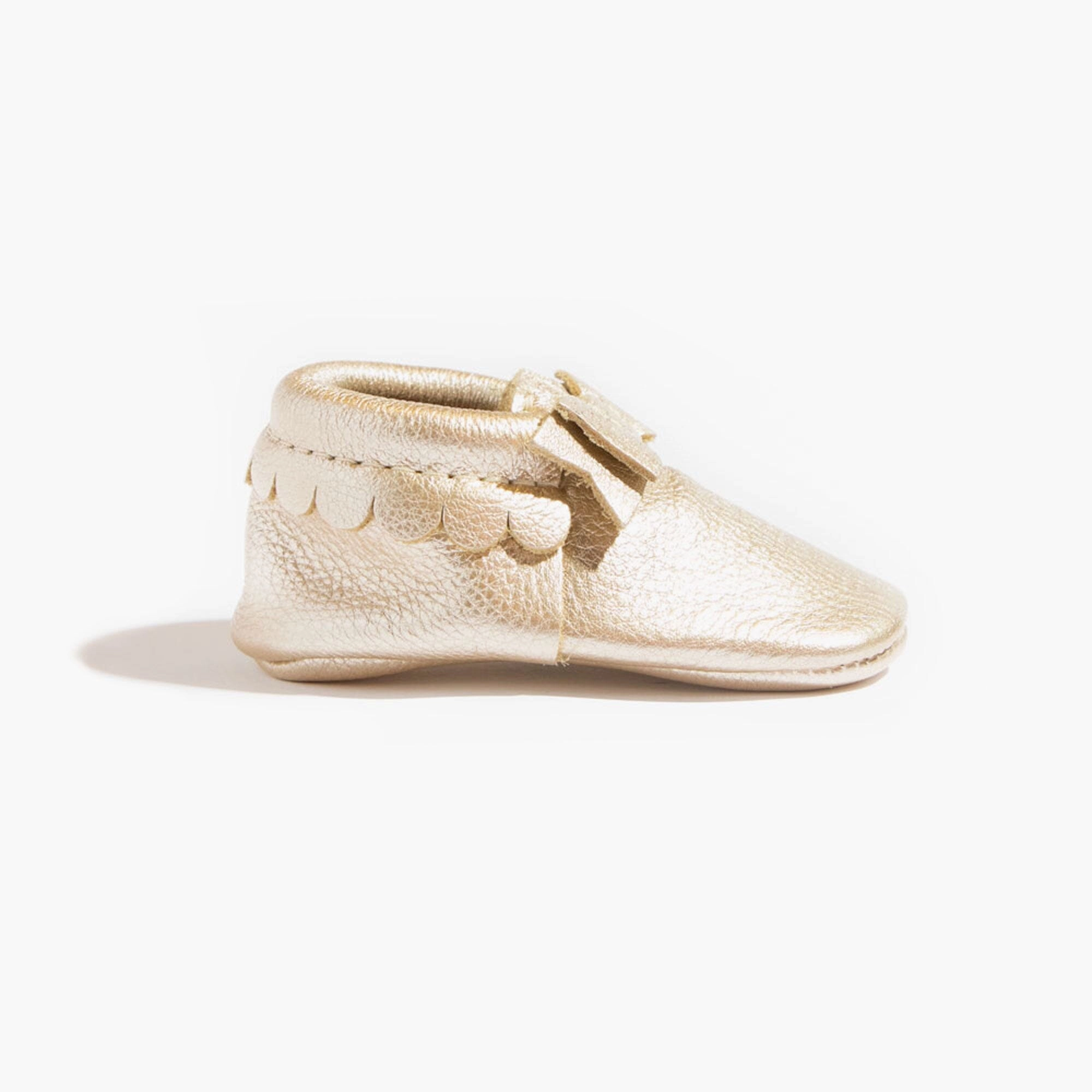 Abrasion resistant SnugFit Platinum Bow Baby Shoe