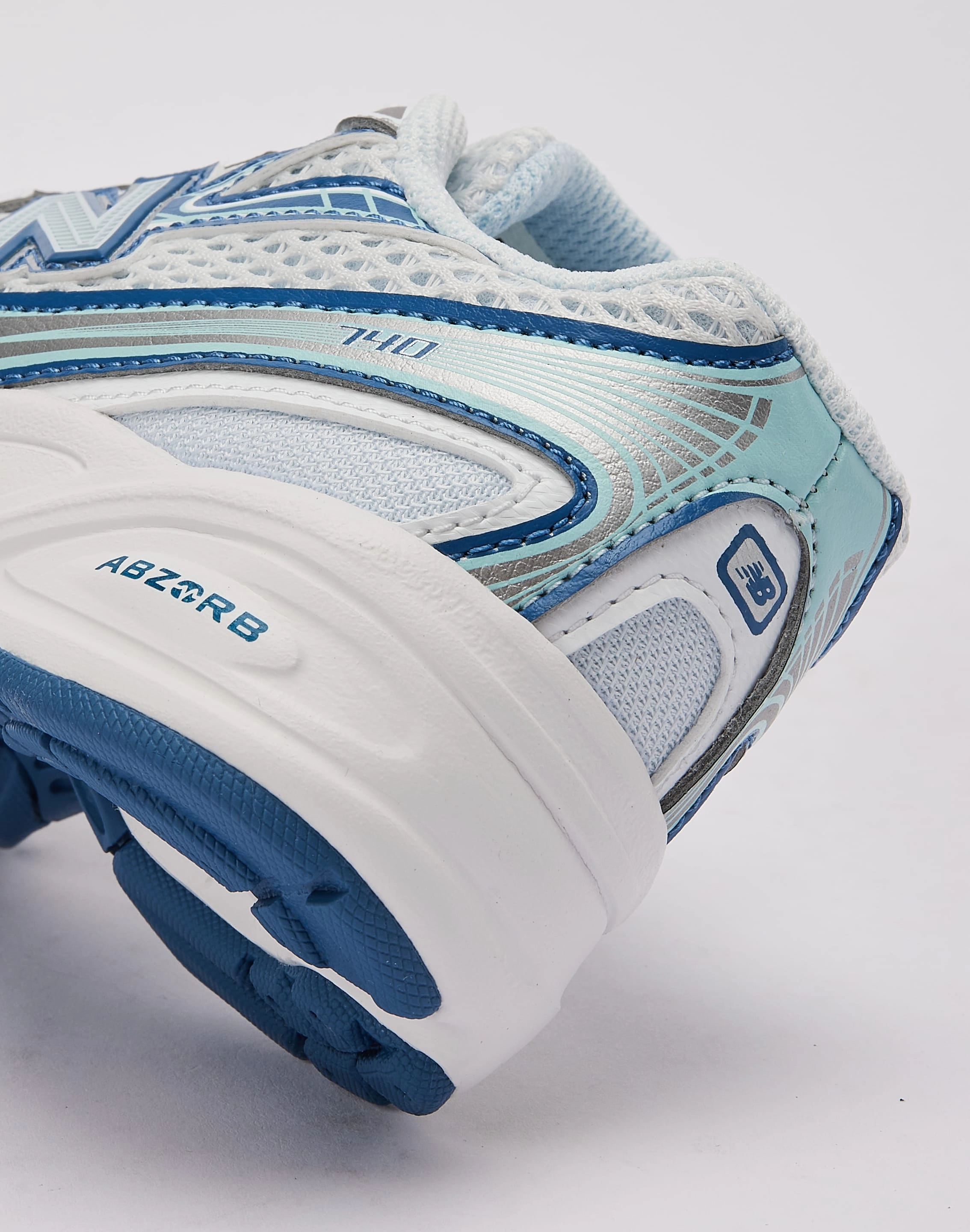 New Balance 740 Bungee Pre-School running in a bamboo bridge area shoes indoor activities