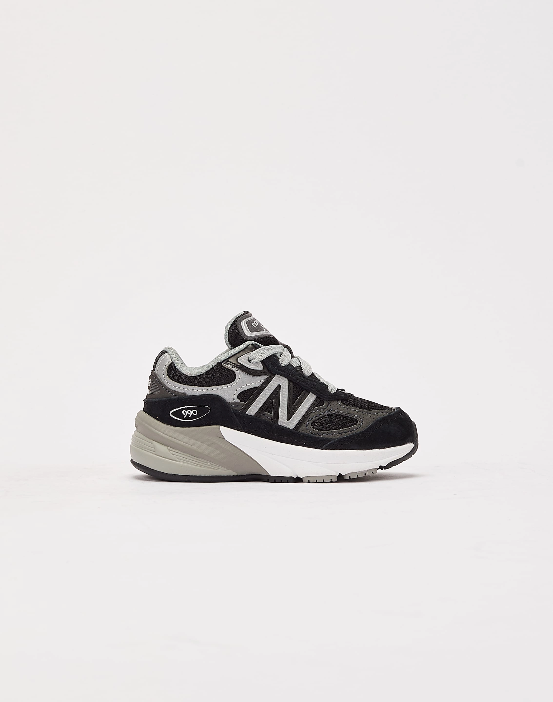 New Balance 990v6 Toddler running in a butte area shoes
